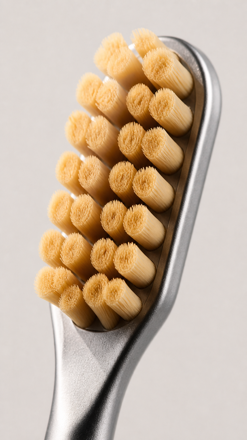 Side-angle macro of dense bamboo-inspired Titan bristles